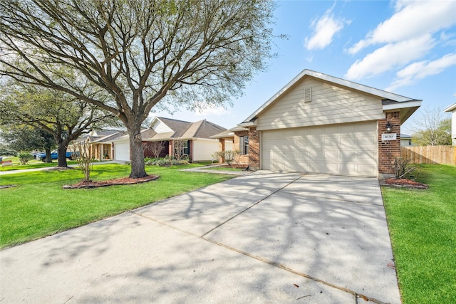 ranch-style house with concrete driveway, a garage, brick siding, and a front yard