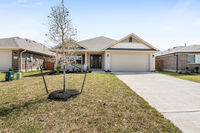 view of front of property featuring driveway, board and batten siding, a front yard, an attached garage, and brick siding