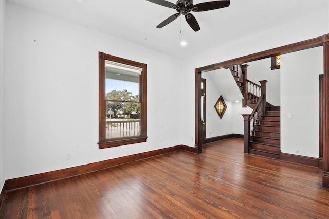 unfurnished living room featuring baseboards, stairway, recessed lighting, a ceiling fan, and wood-type flooring