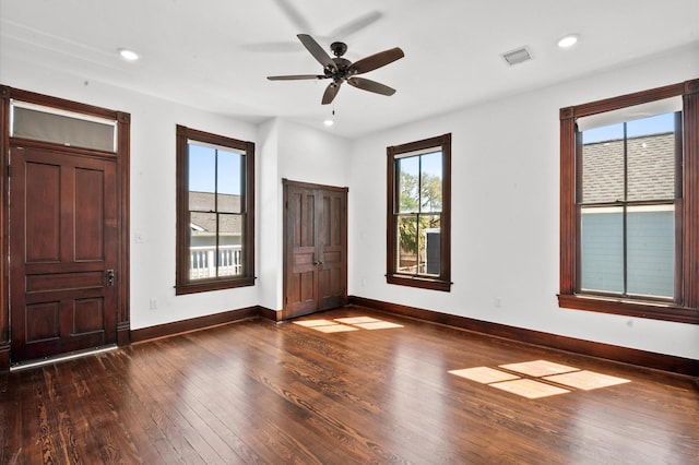 foyer entrance featuring recessed lighting, visible vents, wood-type flooring, and baseboards