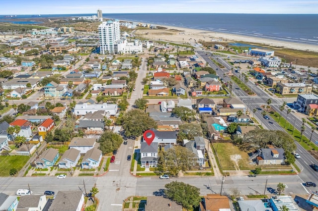 bird's eye view featuring a beach view and a water view