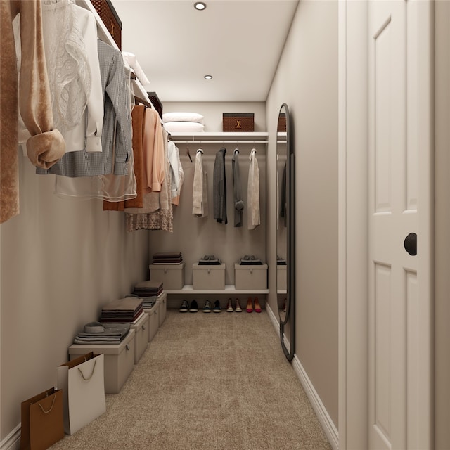 walk in closet with carpet