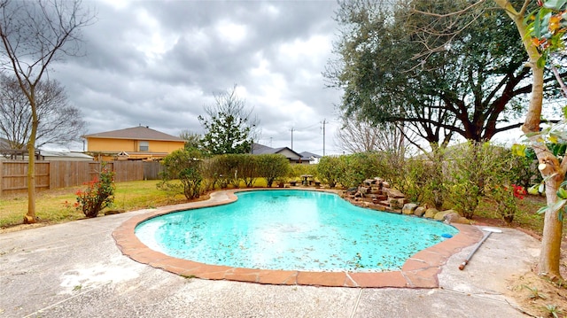 view of pool featuring a fenced in pool, a patio, and a fenced backyard