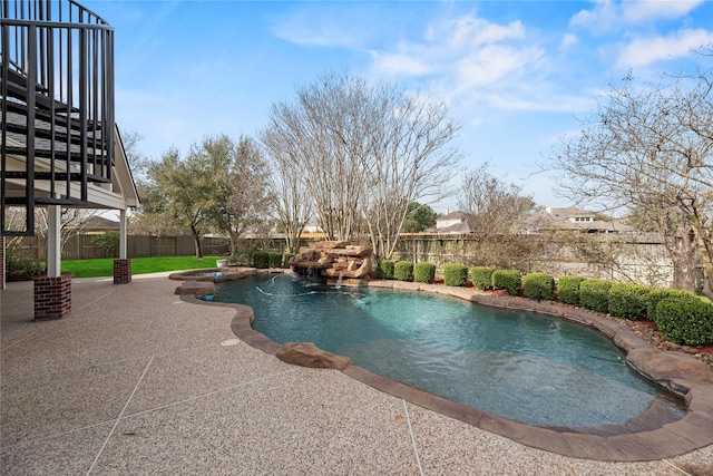 view of pool with a patio area, a fenced in pool, and a fenced backyard