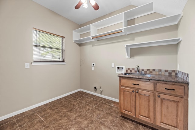 laundry room with baseboards, gas dryer hookup, hookup for a washing machine, hookup for an electric dryer, and a sink