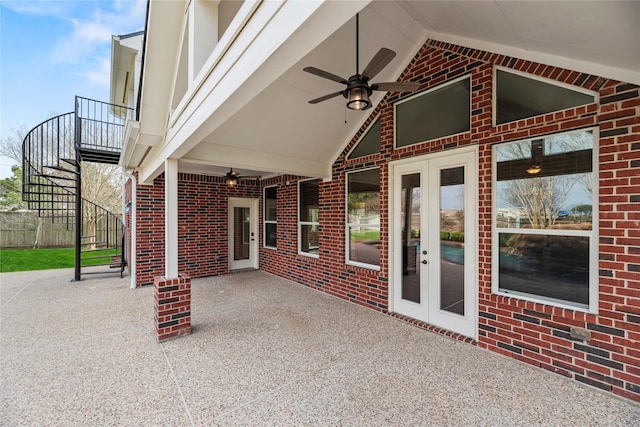 view of patio / terrace with stairway, french doors, and a ceiling fan