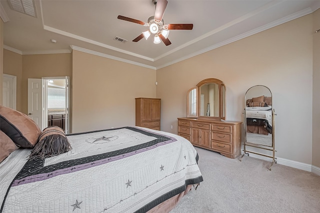 bedroom with light carpet, visible vents, crown molding, and a raised ceiling