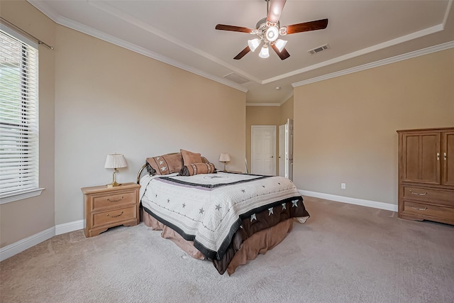 bedroom featuring visible vents, light colored carpet, and baseboards