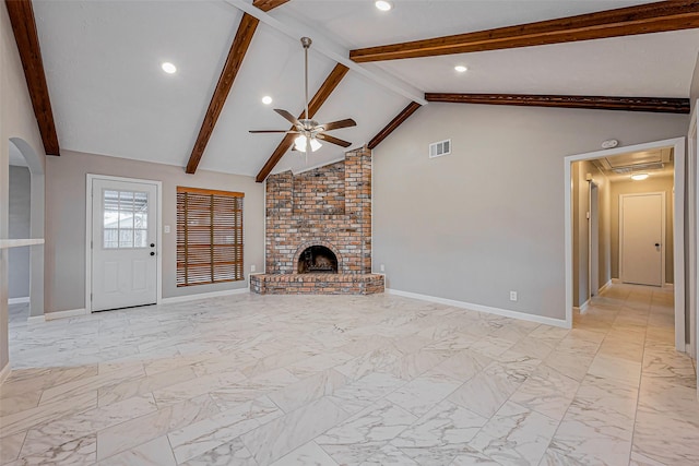 unfurnished living room featuring baseboards, beam ceiling, a fireplace, marble finish floor, and a ceiling fan