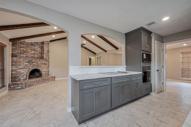 kitchen with vaulted ceiling with beams, gray cabinets, arched walkways, oven, and marble finish floor