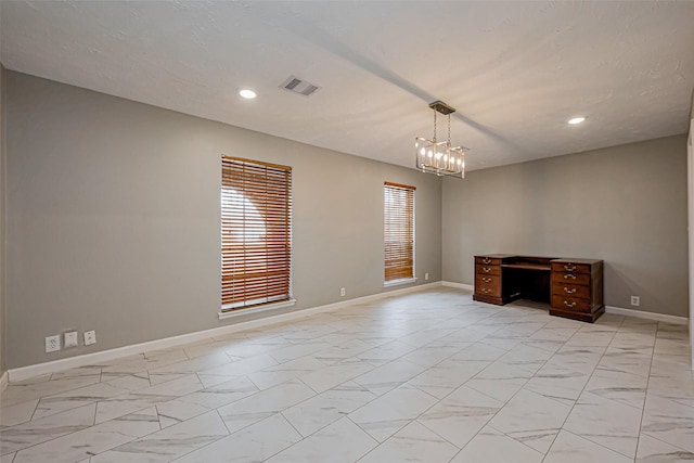 unfurnished room featuring visible vents, marble finish floor, recessed lighting, baseboards, and a chandelier