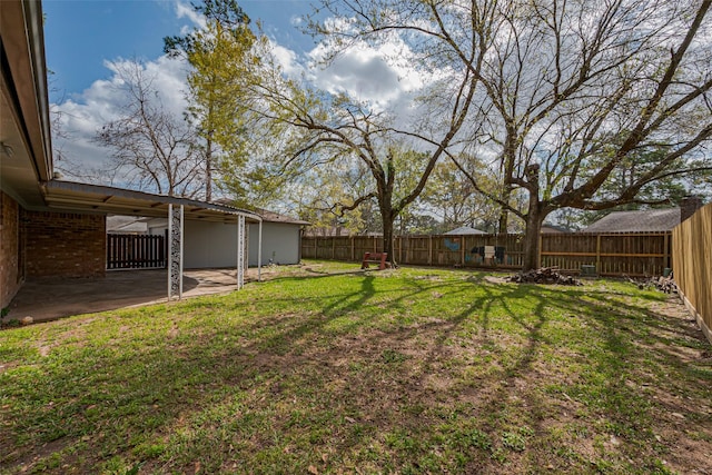 view of yard featuring a fenced backyard and a patio