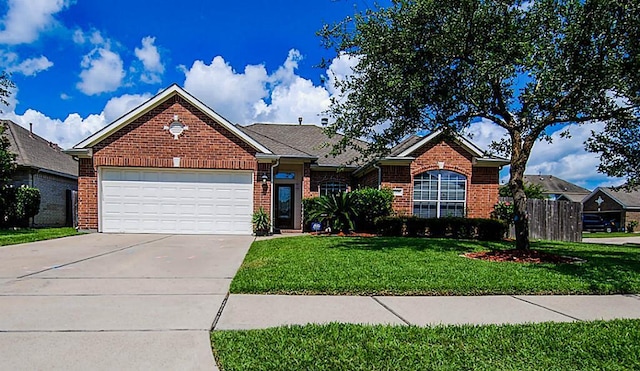 ranch-style house featuring brick siding, fence, a front yard, driveway, and an attached garage