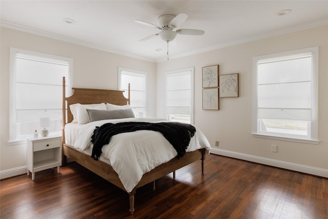 bedroom with ceiling fan, dark wood-type flooring, baseboards, and ornamental molding