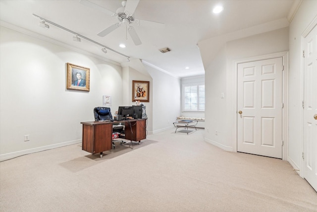 home office with light colored carpet, rail lighting, crown molding, and baseboards