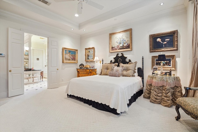 bedroom featuring visible vents, a tray ceiling, recessed lighting, crown molding, and carpet flooring