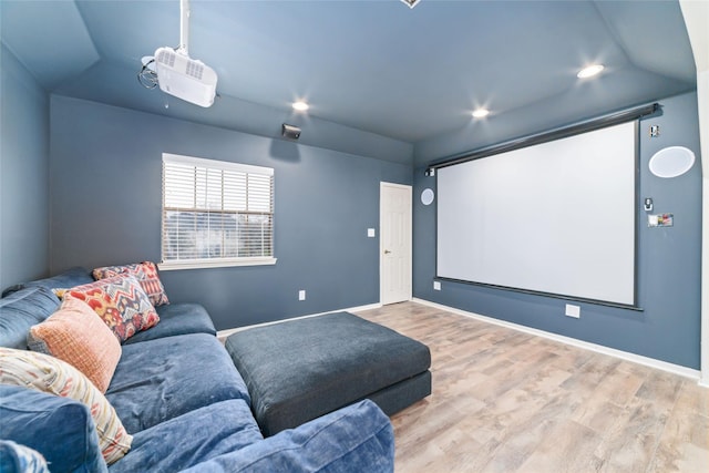 cinema with recessed lighting, wood finished floors, and baseboards