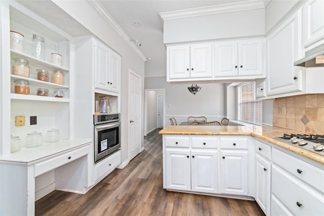 kitchen with ornamental molding, open shelves, stainless steel appliances, a peninsula, and white cabinets