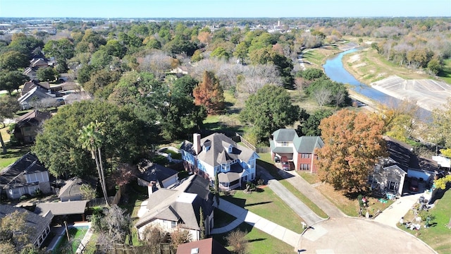 bird's eye view featuring a residential view and a water view