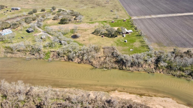 aerial view featuring a water view and a rural view