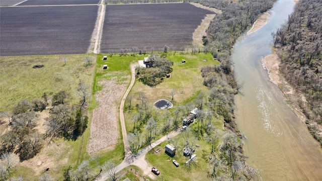 bird's eye view featuring a rural view and a water view