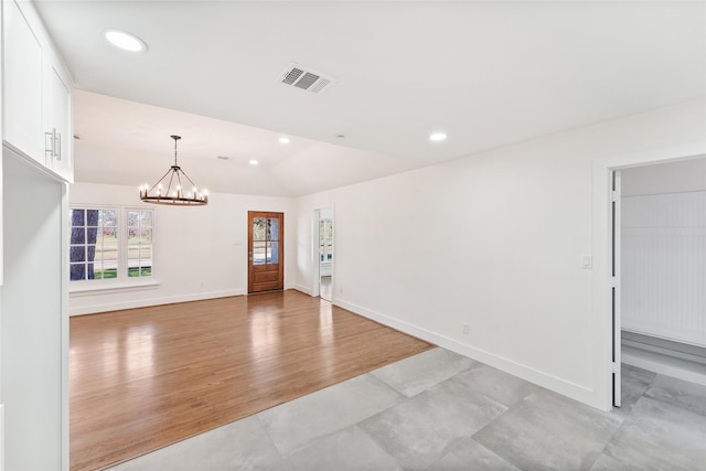 interior space with recessed lighting, visible vents, baseboards, and a chandelier