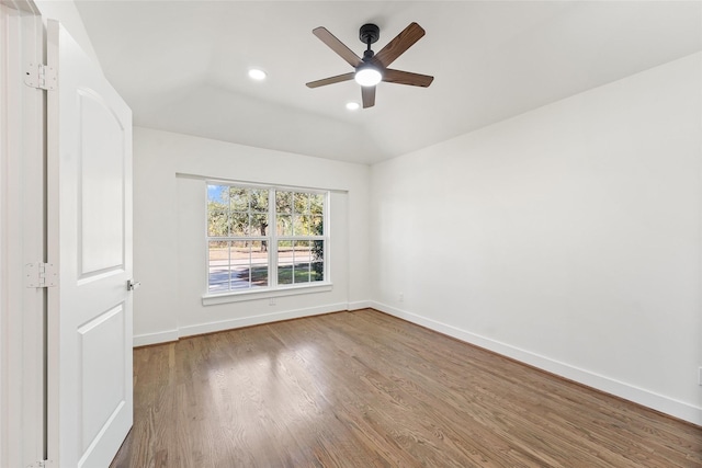 empty room with recessed lighting, baseboards, a ceiling fan, and wood finished floors