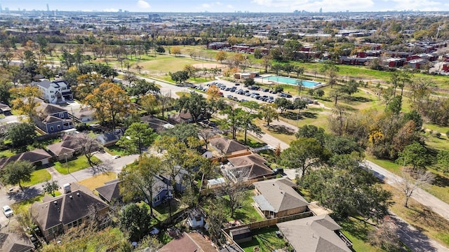 birds eye view of property with a residential view