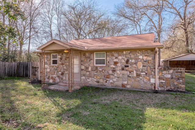 view of outdoor structure with fence