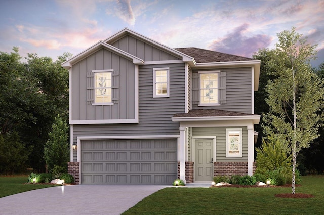 view of front of house featuring driveway, brick siding, a front lawn, a garage, and board and batten siding