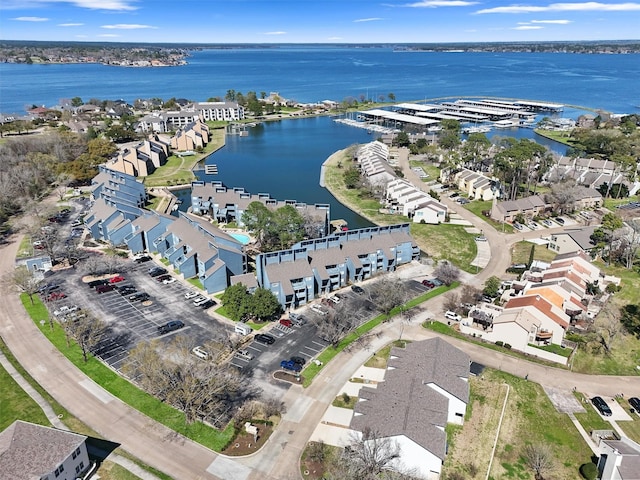 aerial view with a residential view and a water view