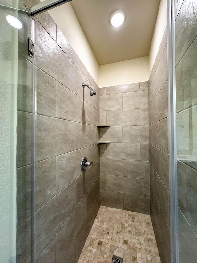 bathroom featuring a stall shower