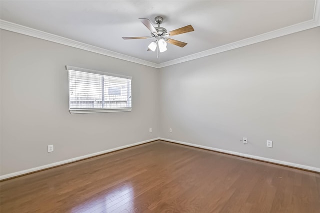 unfurnished room featuring ornamental molding, baseboards, a ceiling fan, and wood finished floors