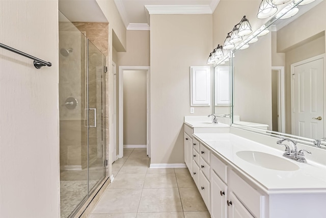 bathroom with crown molding, double vanity, a stall shower, tile patterned floors, and a sink