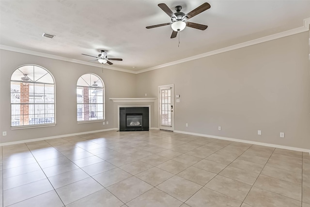 unfurnished living room featuring light tile patterned floors, baseboards, and ornamental molding