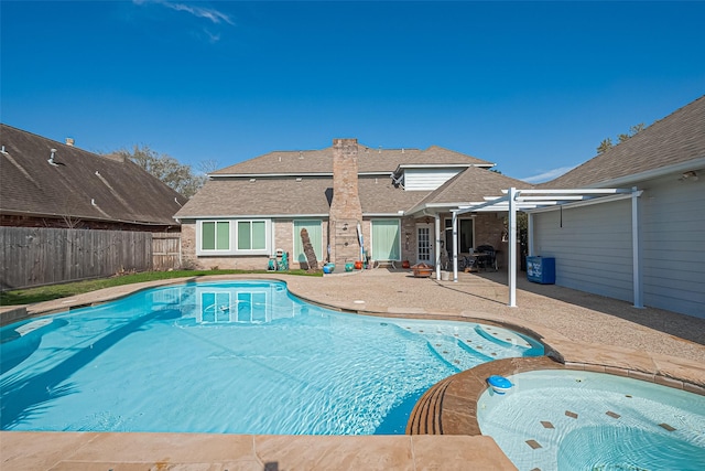 view of pool featuring a patio area, a fenced in pool, and a fenced backyard