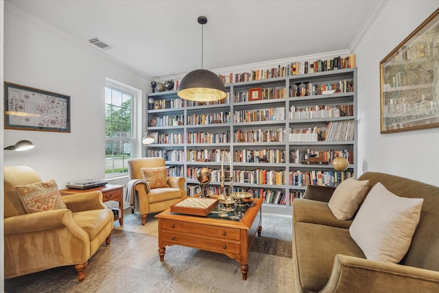 sitting room featuring visible vents, carpet floors, and ornamental molding