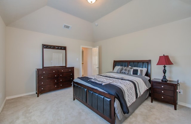 bedroom with lofted ceiling, baseboards, visible vents, and carpet floors