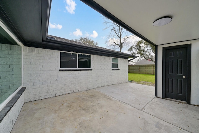 view of patio with fence