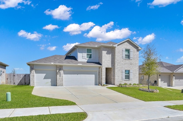 traditional home with driveway, a front lawn, fence, a garage, and brick siding