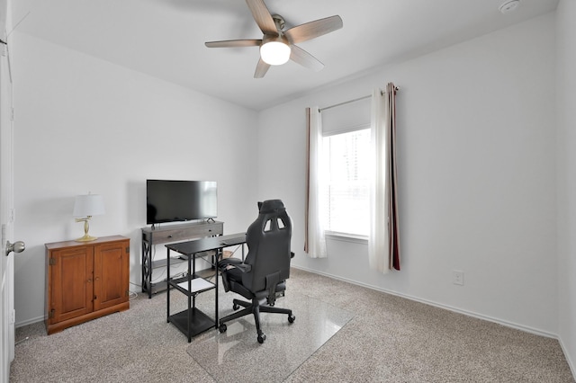 office with baseboards, light carpet, and ceiling fan