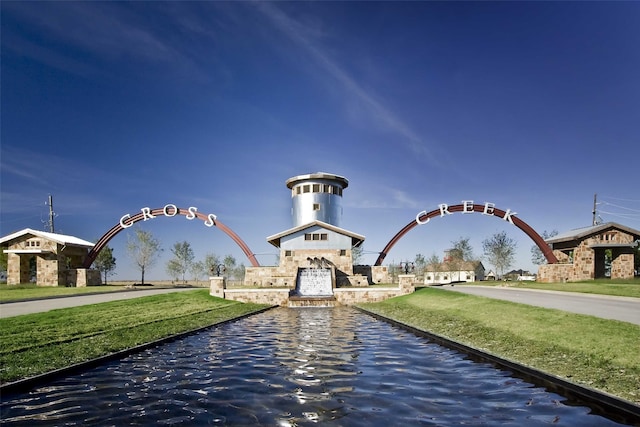 view of community featuring a lawn