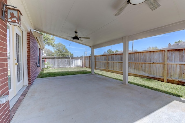 view of patio / terrace with a fenced backyard and ceiling fan