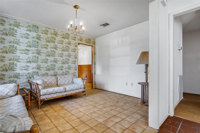 sitting room featuring visible vents, an inviting chandelier, ornamental molding, and tile patterned flooring