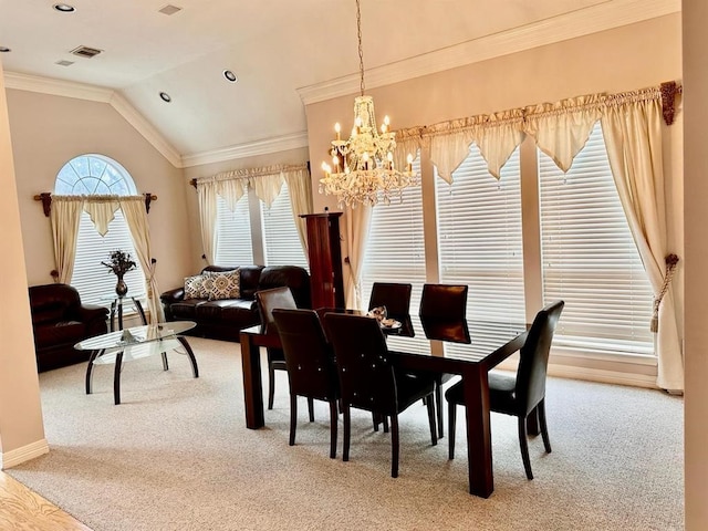 dining area with visible vents, carpet, ornamental molding, and vaulted ceiling