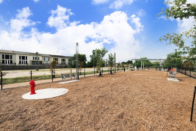 view of property's community with fence