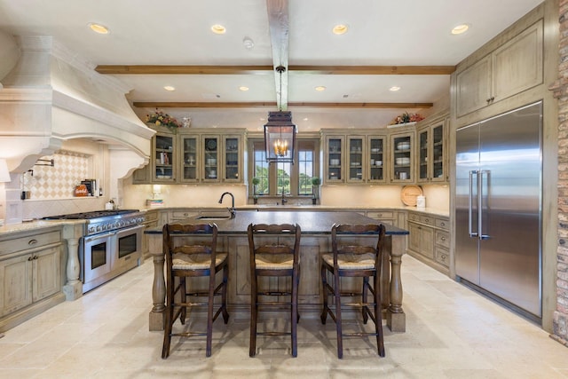 kitchen with a sink, custom range hood, beamed ceiling, premium appliances, and backsplash