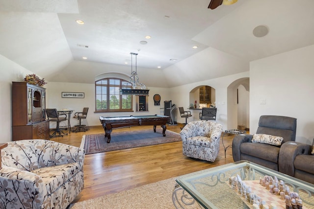 recreation room featuring wood finished floors, recessed lighting, arched walkways, pool table, and vaulted ceiling