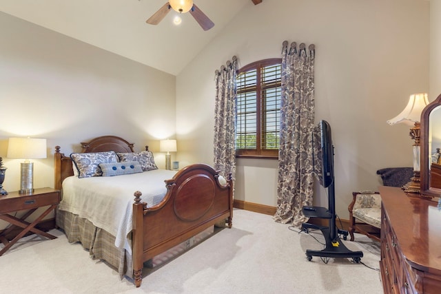 bedroom with vaulted ceiling, carpet, baseboards, and ceiling fan