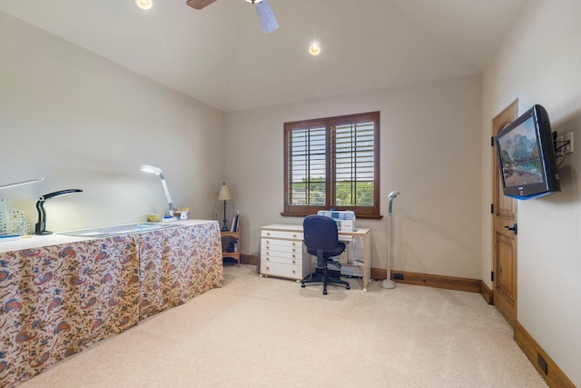 carpeted office space featuring recessed lighting, baseboards, a ceiling fan, and vaulted ceiling